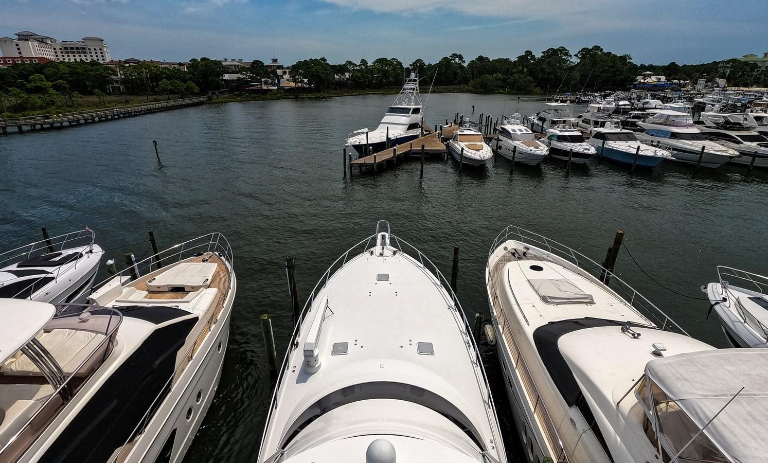 a group of boats are parked in a harbor aboard BENEDETTA Yacht for Sale
