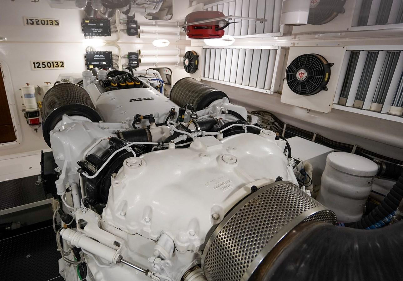 a white car with a hood aboard BENEDETTA Yacht for Sale