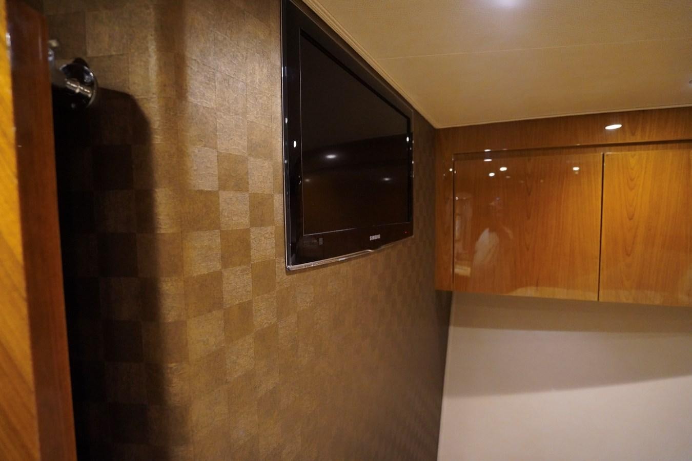 a tv on a wall aboard BENEDETTA Yacht for Sale