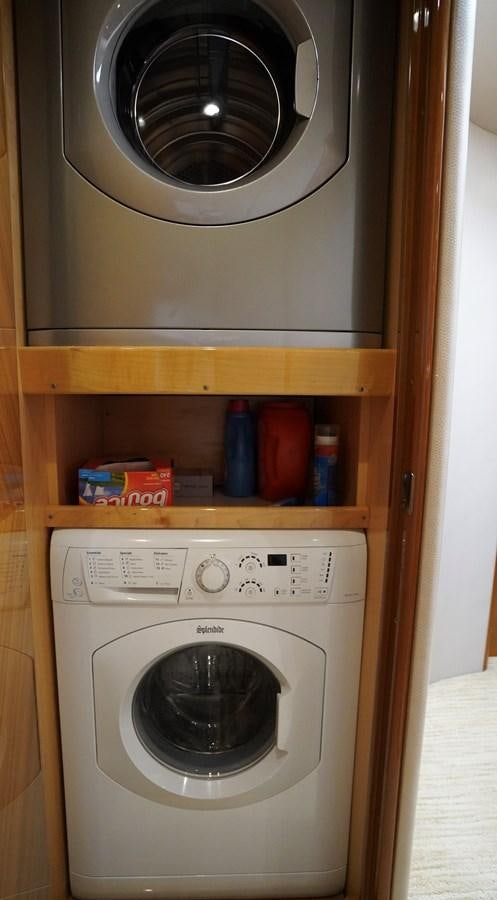 a white washing machine aboard BENEDETTA Yacht for Sale