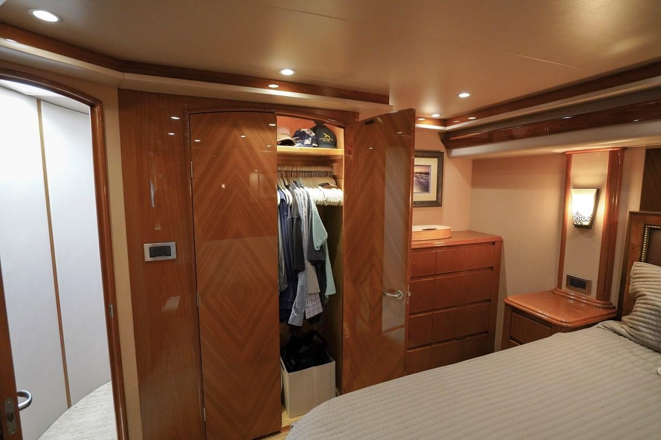 a closet and a bed in a room aboard BENEDETTA Yacht for Sale