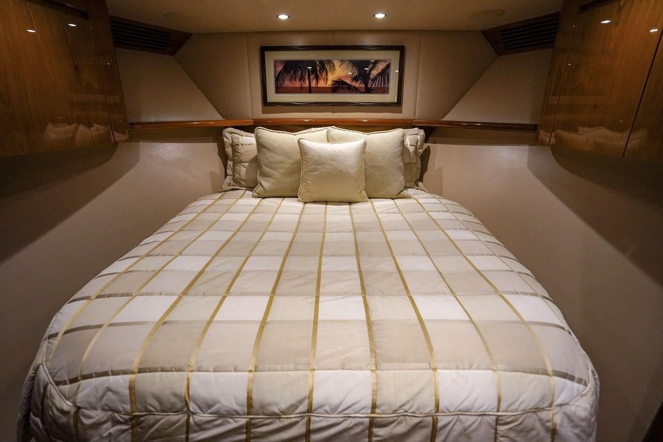 a bed with white sheets aboard BENEDETTA Yacht for Sale