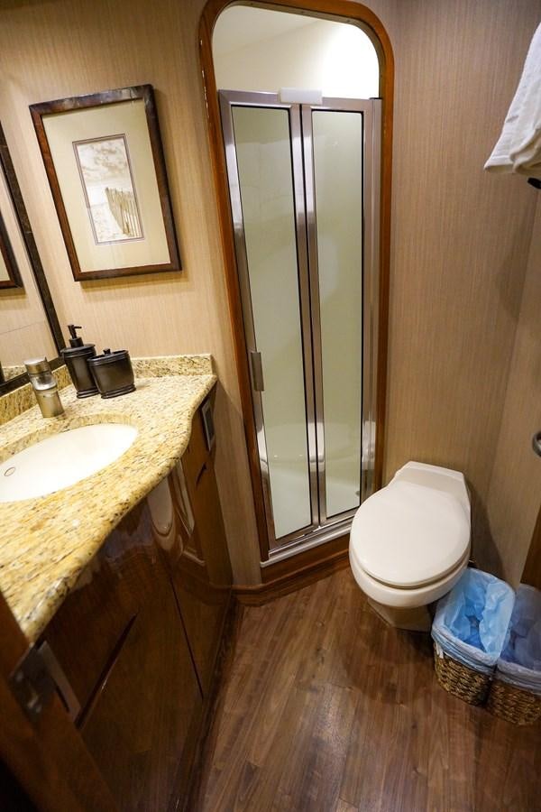 a bathroom with a large mirror aboard BENEDETTA Yacht for Sale