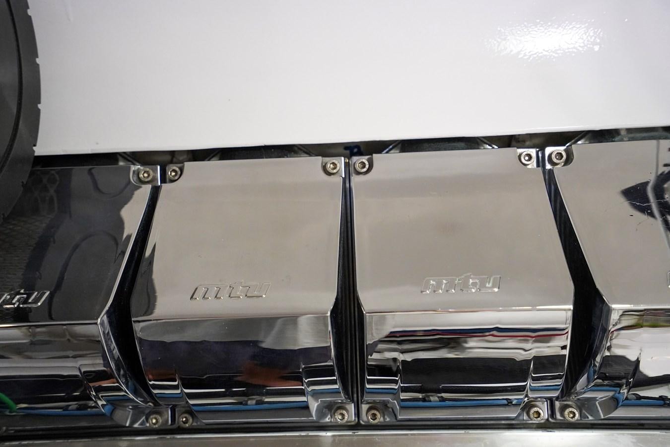 the front of a white laptop aboard BENEDETTA Yacht for Sale