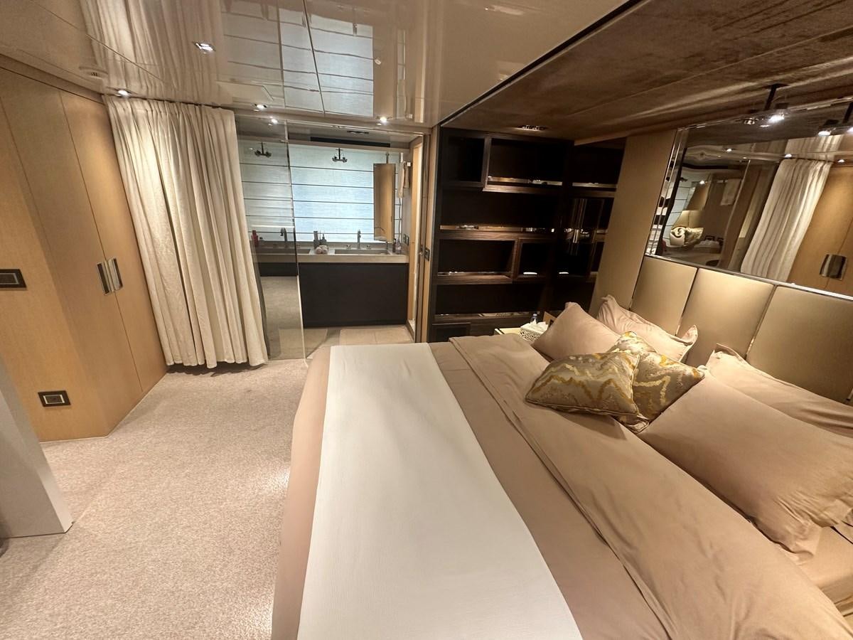 a room with a bed and a staircase aboard SL 94' Yacht for Sale