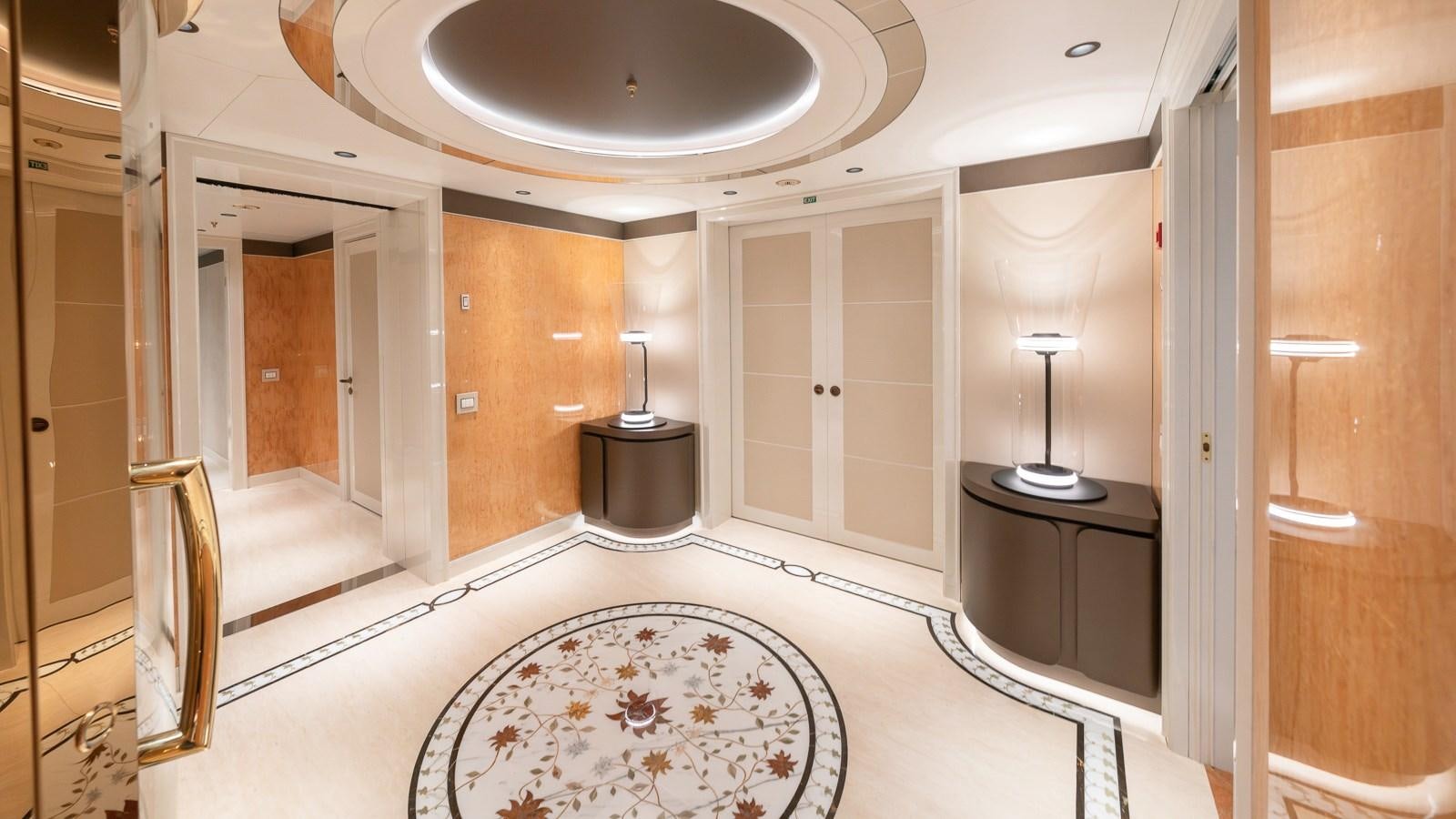 a large bathroom with a round shower aboard AELIA Yacht for Sale