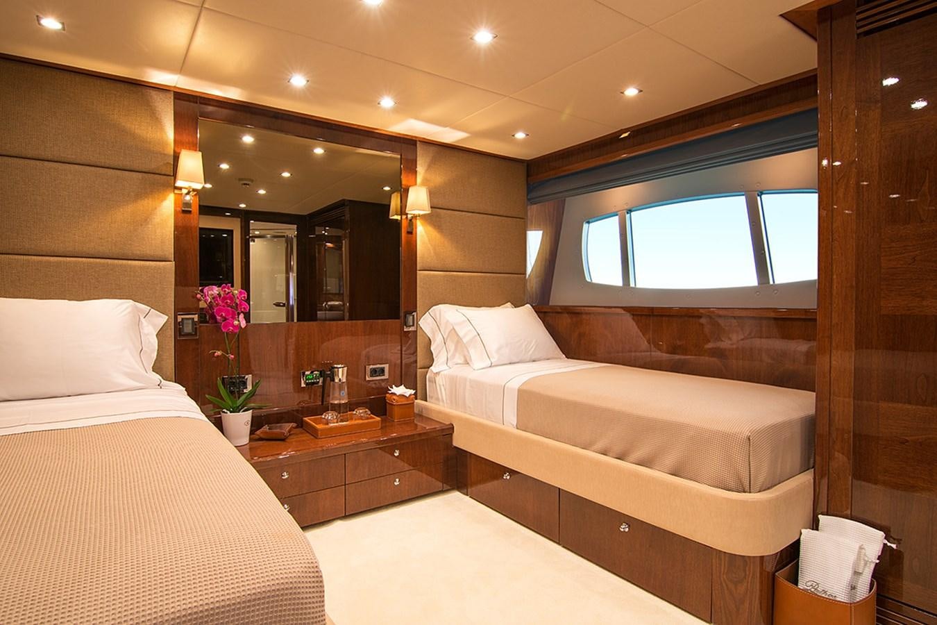 a room with two beds aboard PATHOS Yacht for Sale