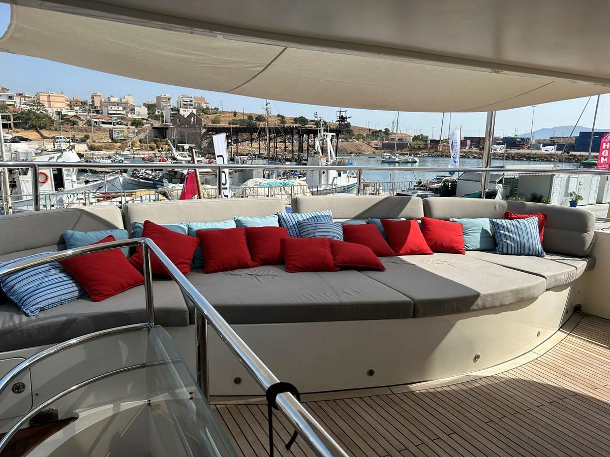a large living room with a view of the city aboard WHISPER Yacht for Sale