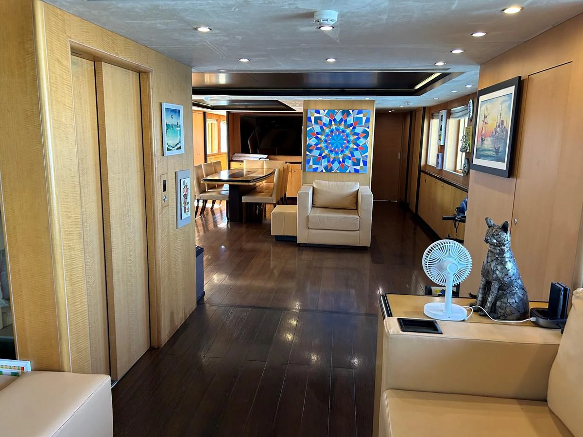 a room with a wood floor and a large mirror aboard WHISPER Yacht for Sale