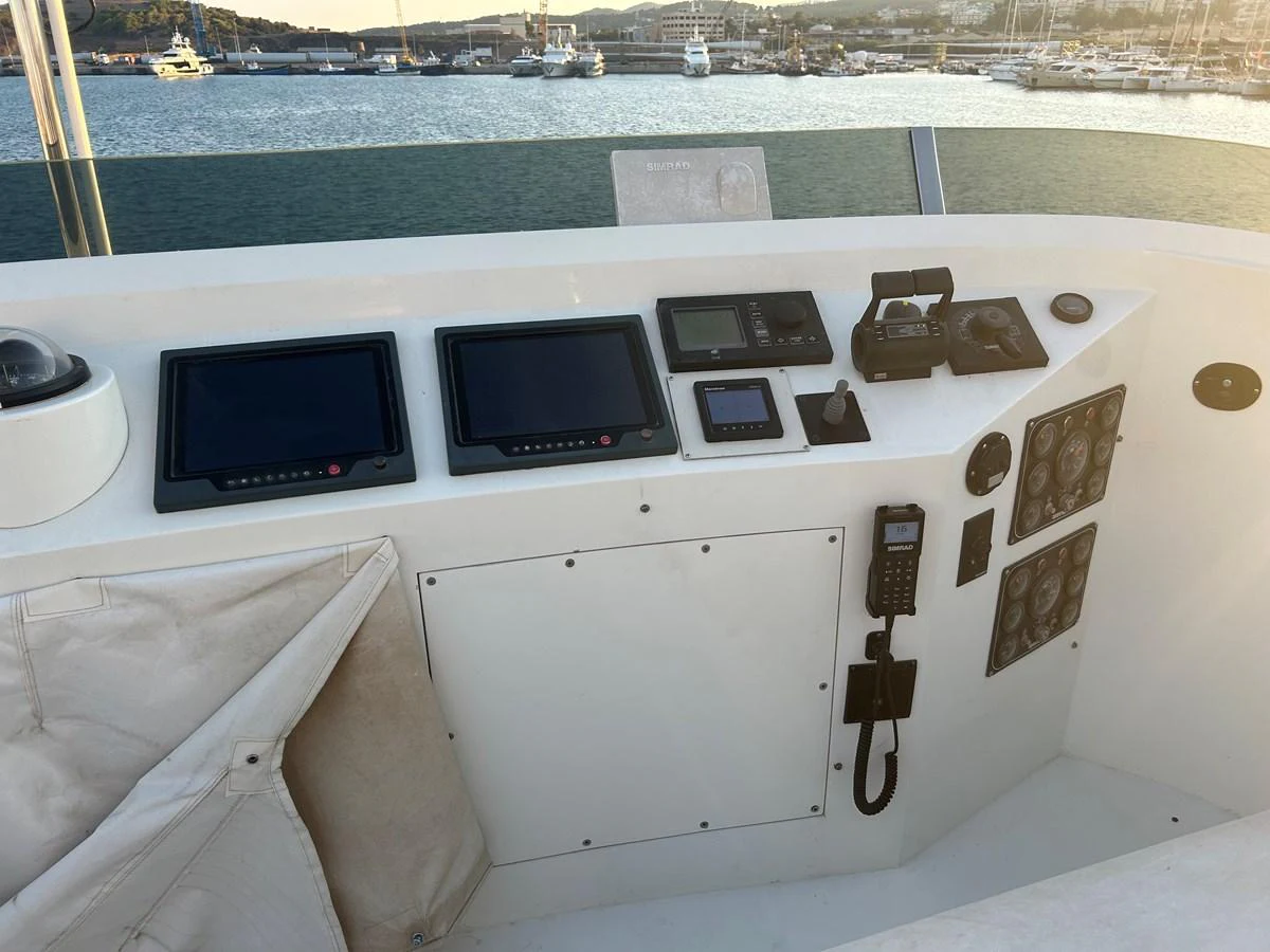 a white boat with many windows aboard WHISPER Yacht for Sale