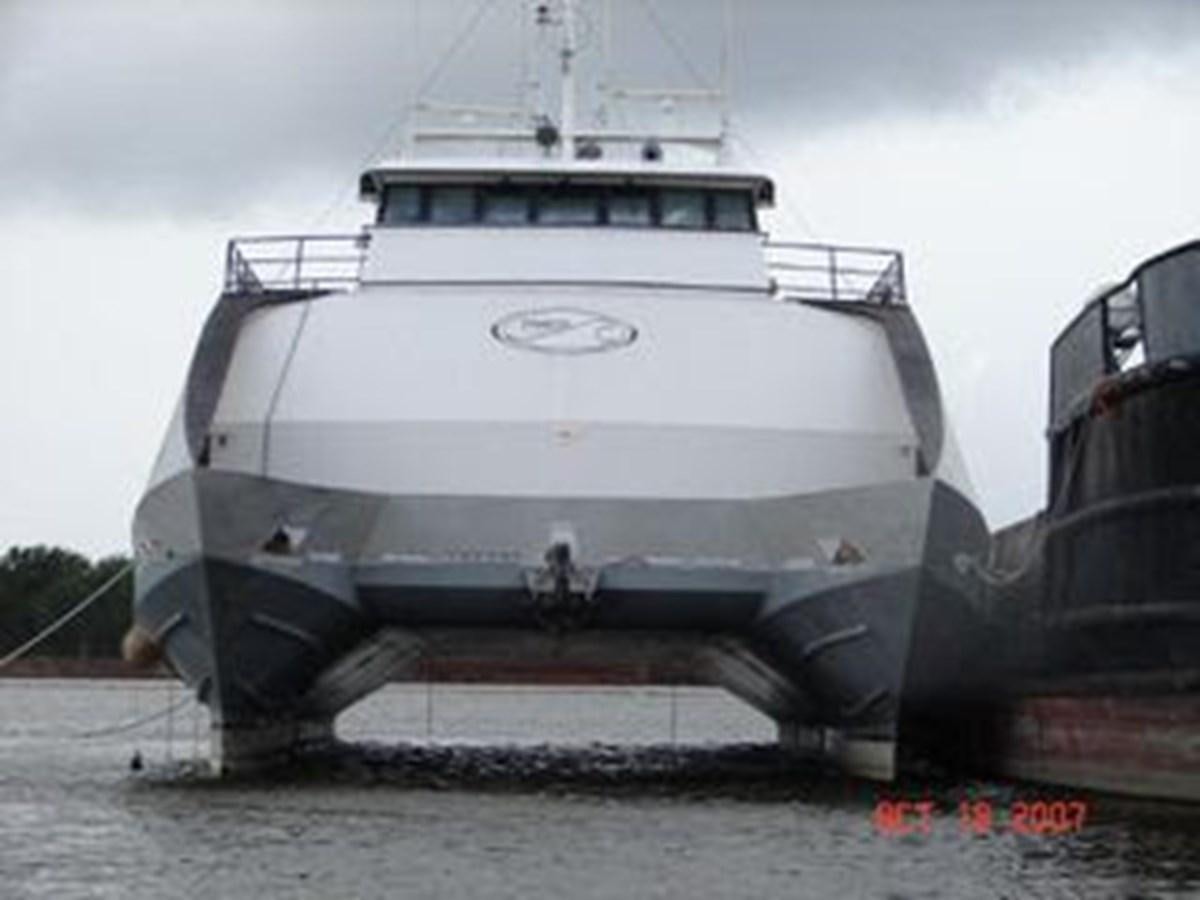 a large ship on the water aboard 1999 EASTERN SWATH 120 Yacht for Sale