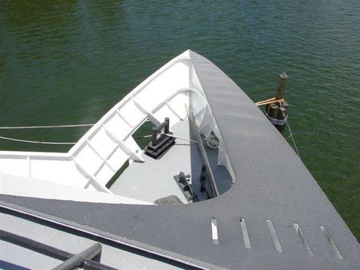 a boat on the water aboard 1999 EASTERN SWATH 120 Yacht for Sale