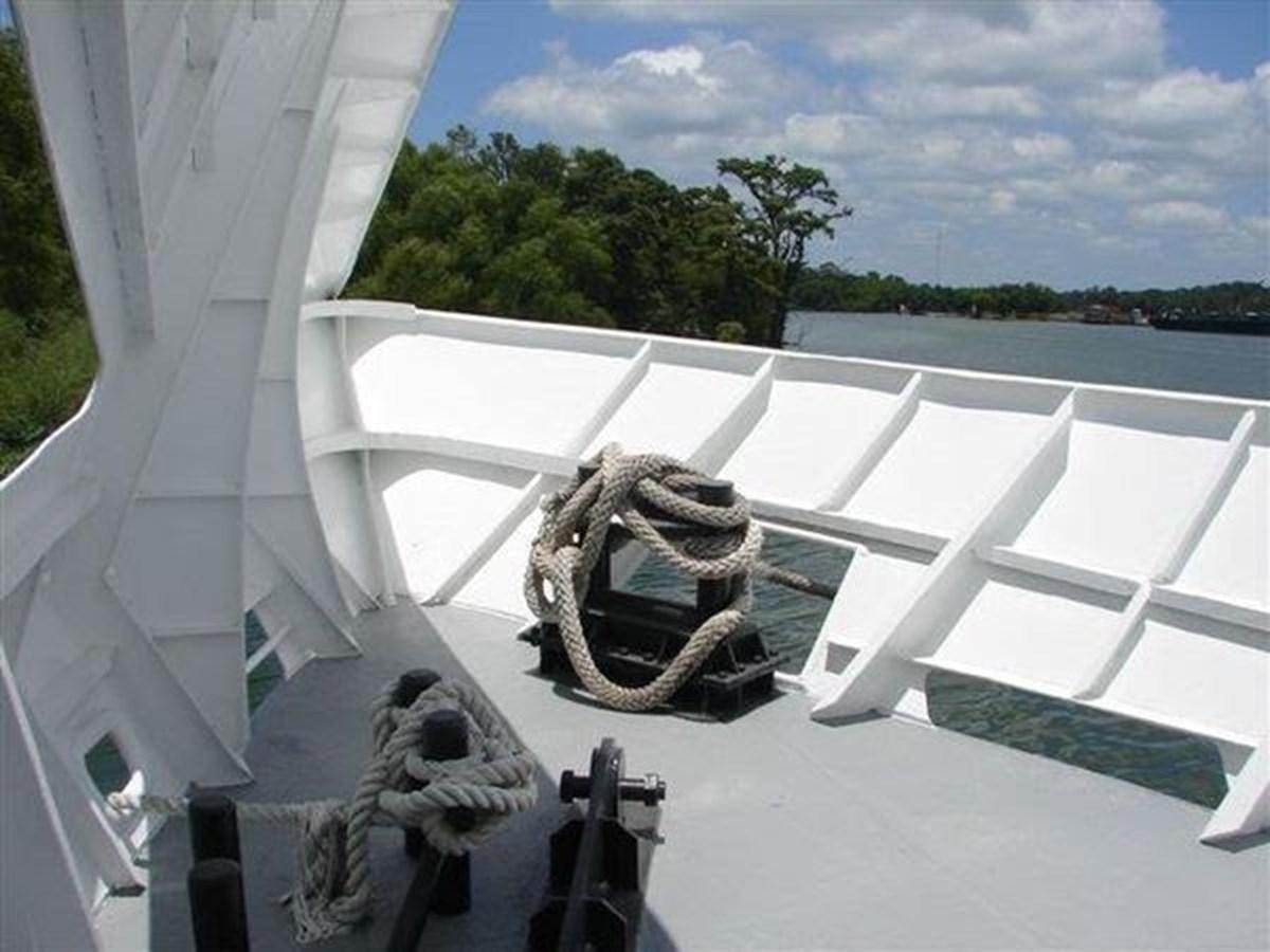 a sculpture on a white chair aboard 1999 EASTERN SWATH 120 Yacht for Sale