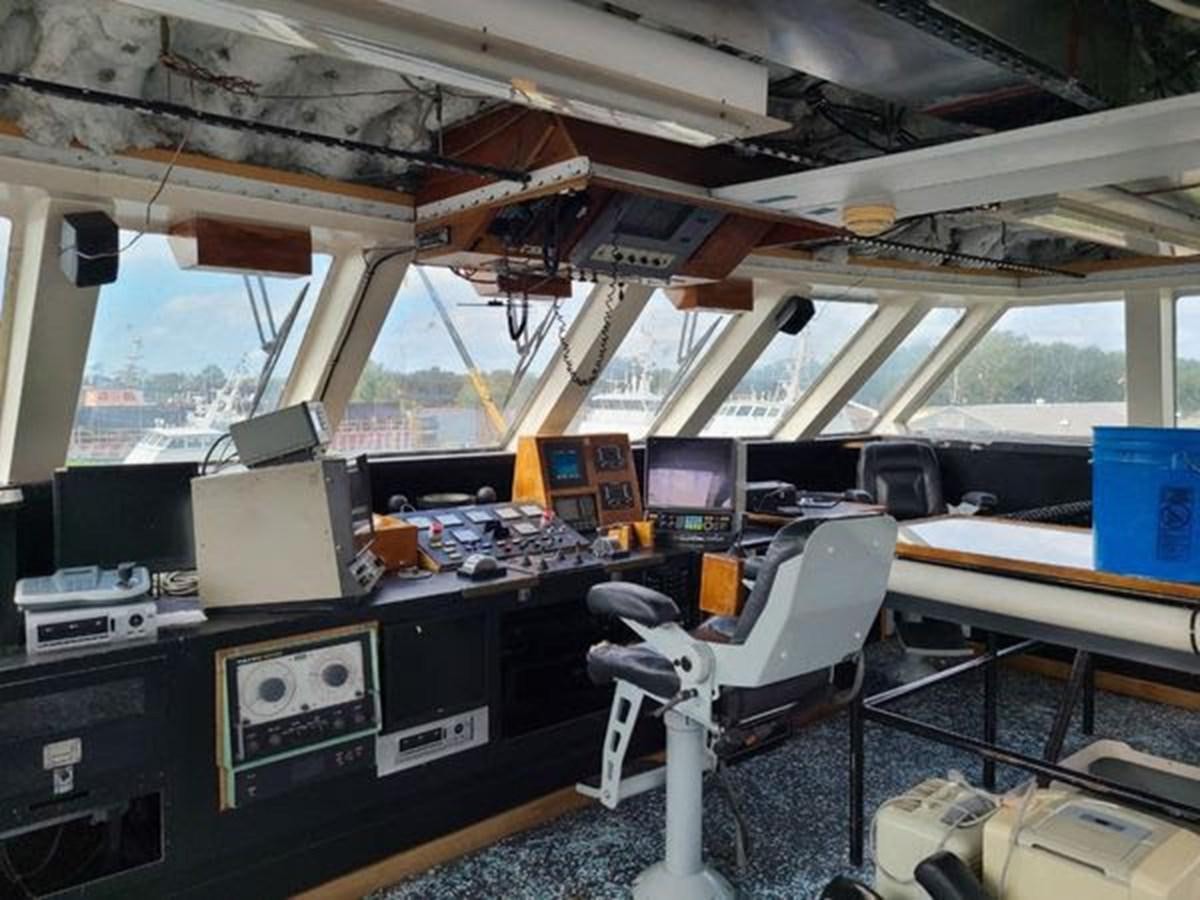a room with computers and monitors aboard 1999 EASTERN SWATH 120 Yacht for Sale