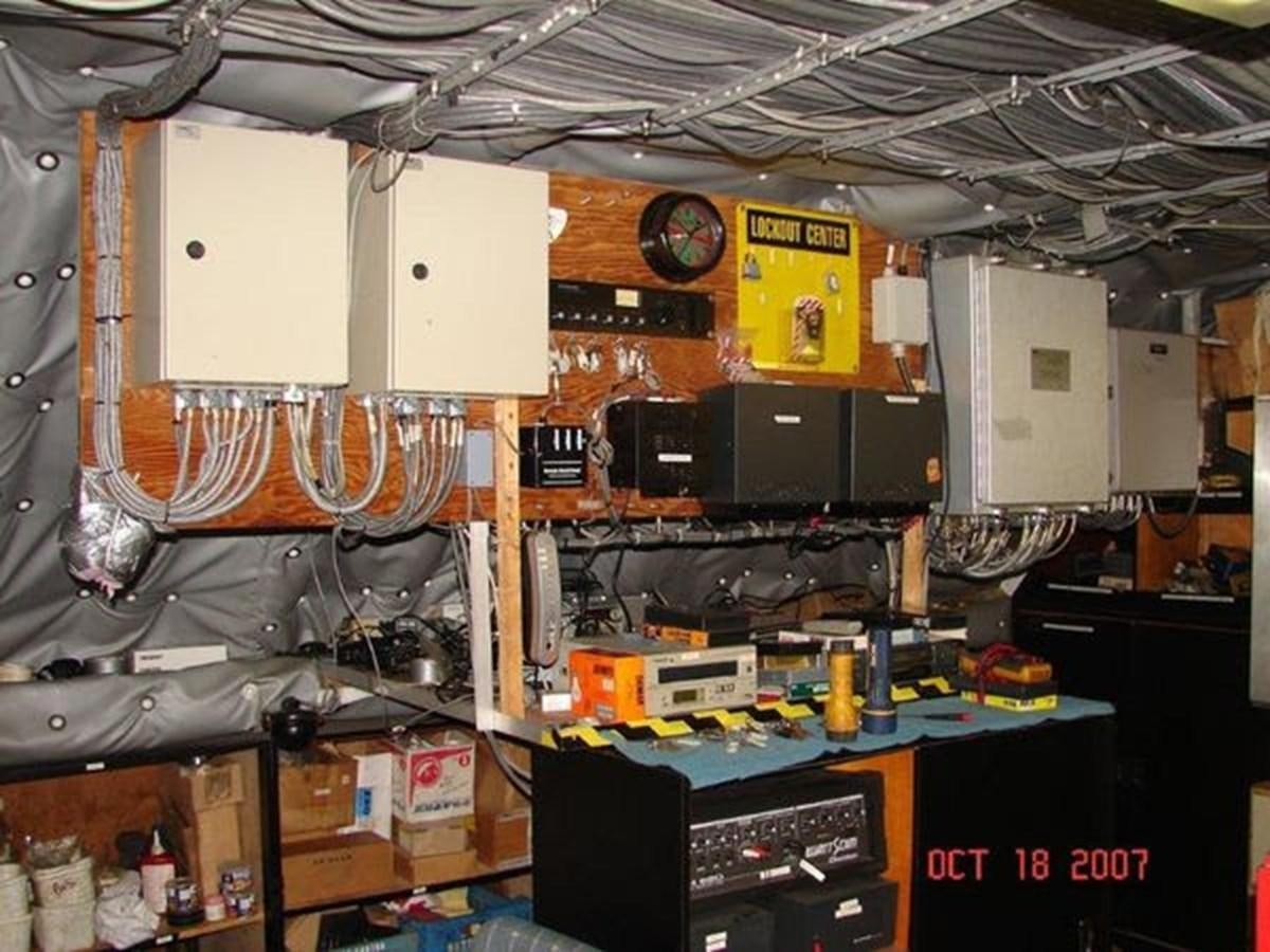 a room with many electronics aboard 1999 EASTERN SWATH 120 Yacht for Sale