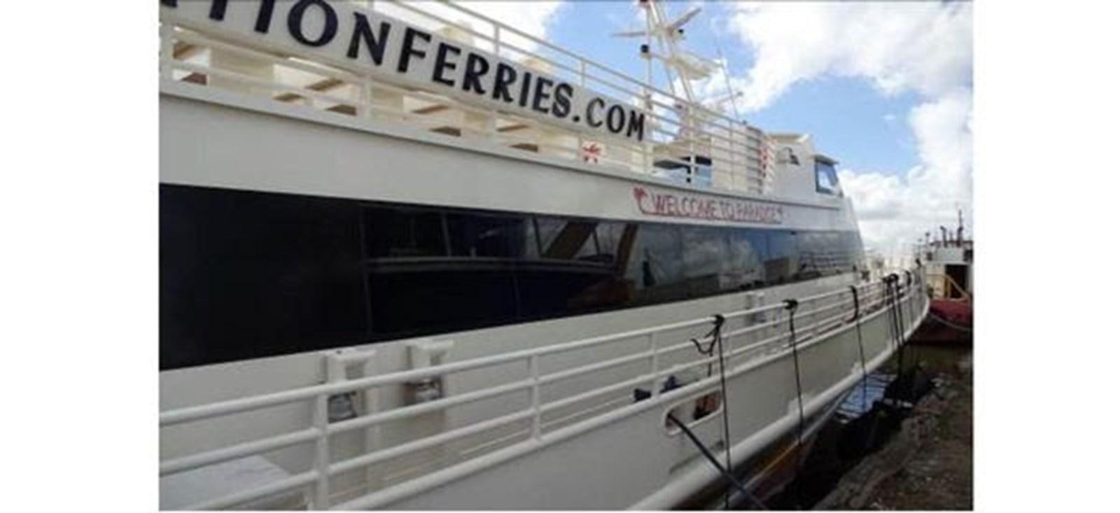 a large boat on the water aboard DREAM STAR Yacht for Sale