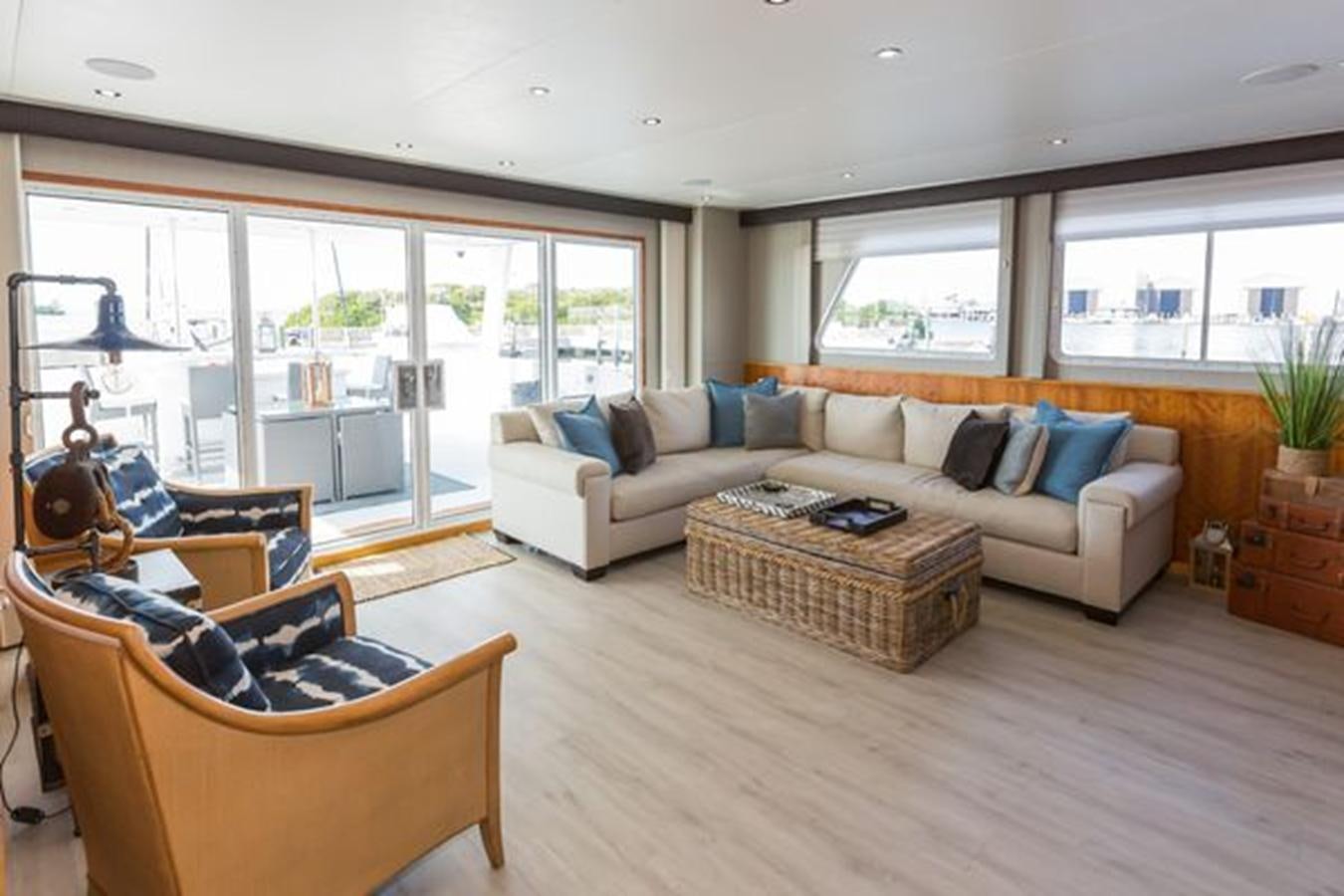 a living room with a large window aboard ISLAND SOUL Yacht for Sale