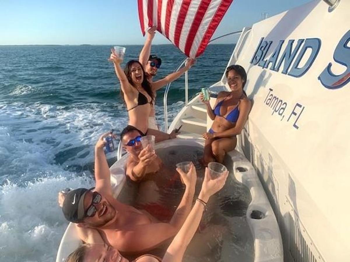 a group of people in a boat aboard ISLAND SOUL Yacht for Sale