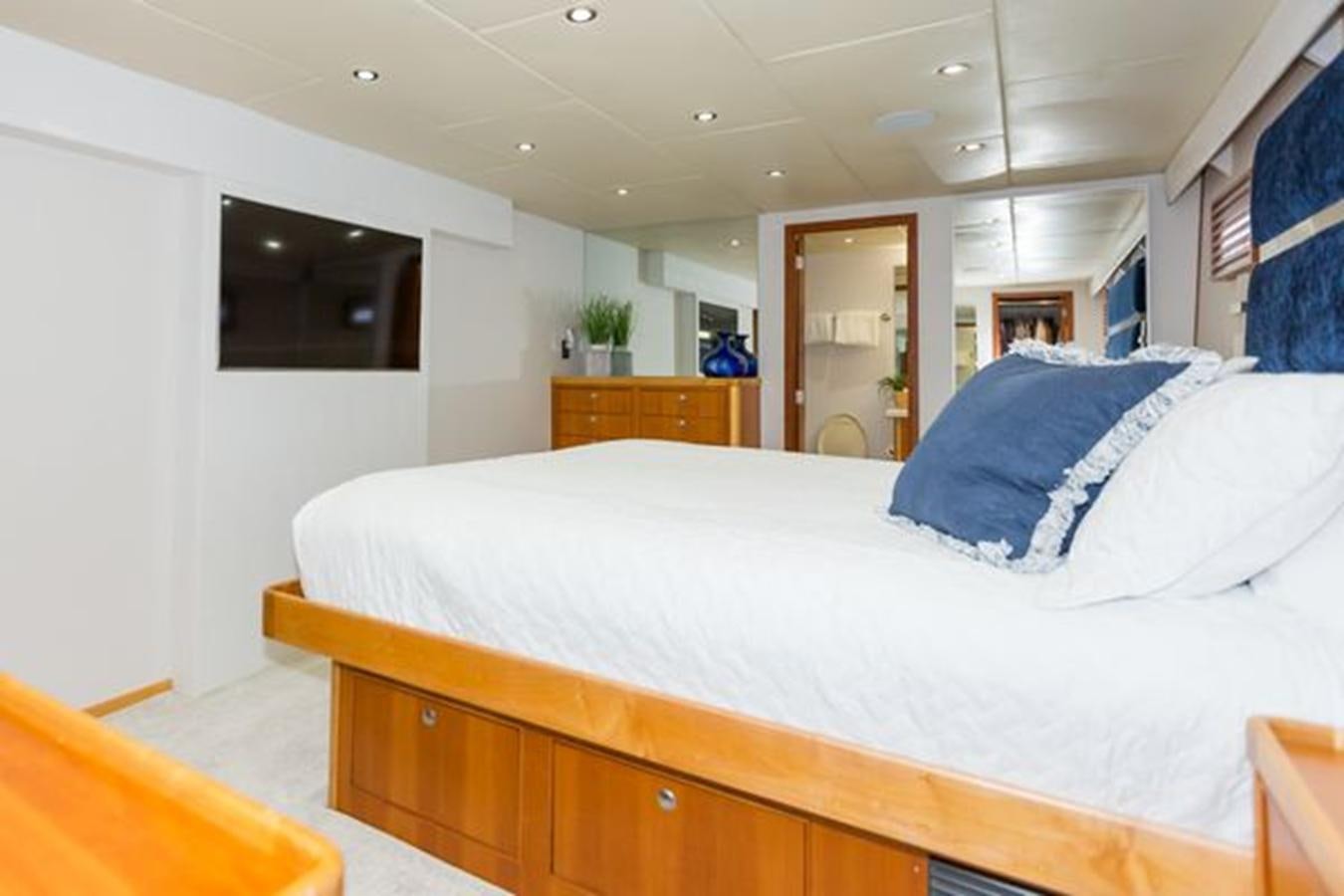 a bedroom with a large bed aboard ISLAND SOUL Yacht for Sale