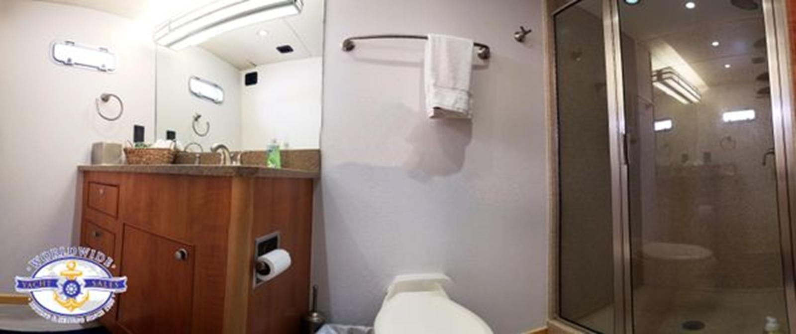 a bathroom with a shower and sink aboard ISLAND SOUL Yacht for Sale