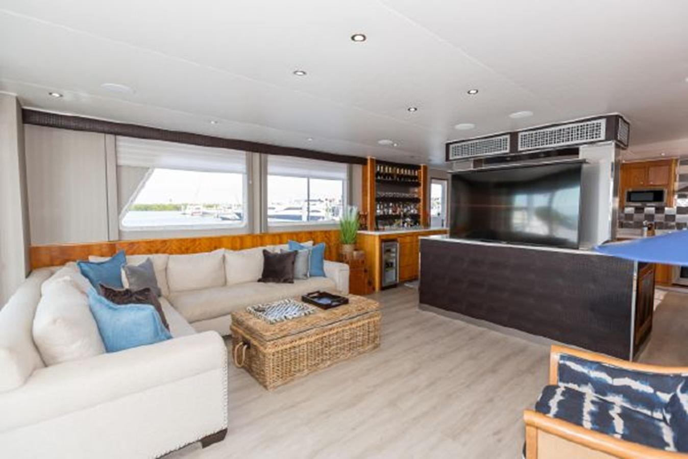 a living room with a couch and a tv aboard ISLAND SOUL Yacht for Sale