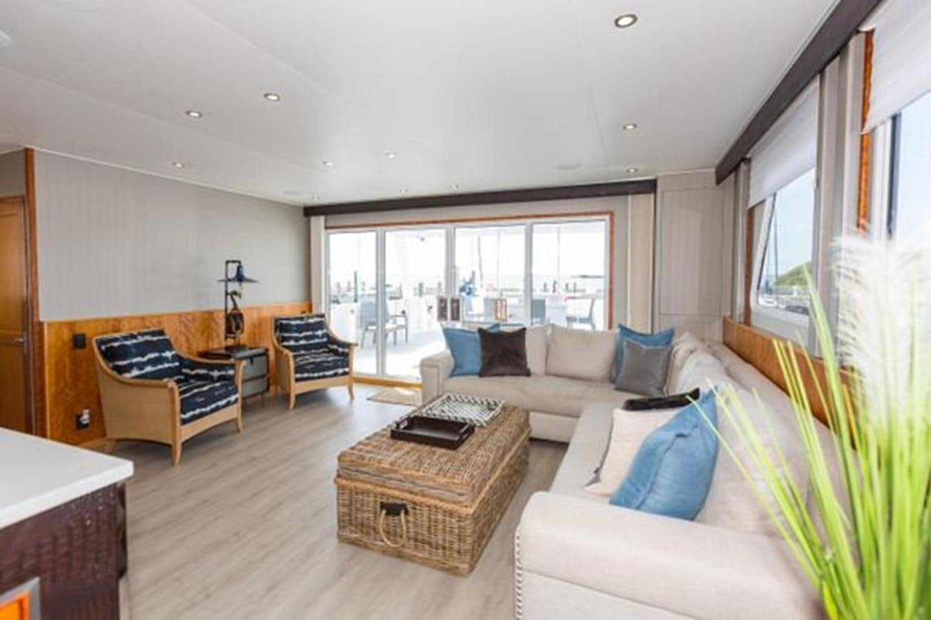 a living room with a couch and a coffee table aboard ISLAND SOUL Yacht for Sale