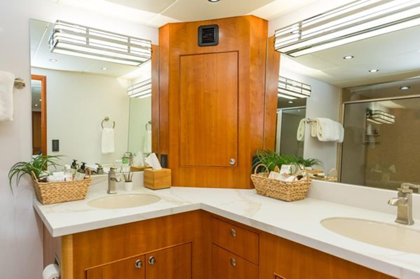 a bathroom with a large mirror aboard ISLAND SOUL Yacht for Sale