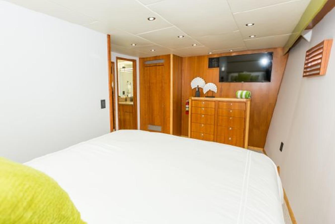 a bedroom with a large bed aboard ISLAND SOUL Yacht for Sale