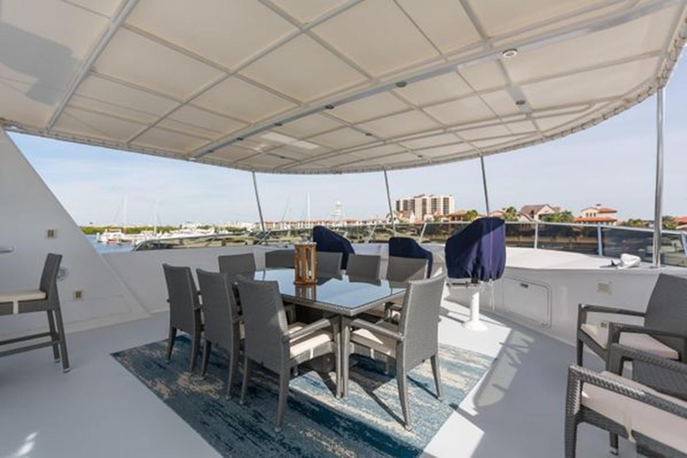 a room with a table and chairs aboard ISLAND SOUL Yacht for Sale