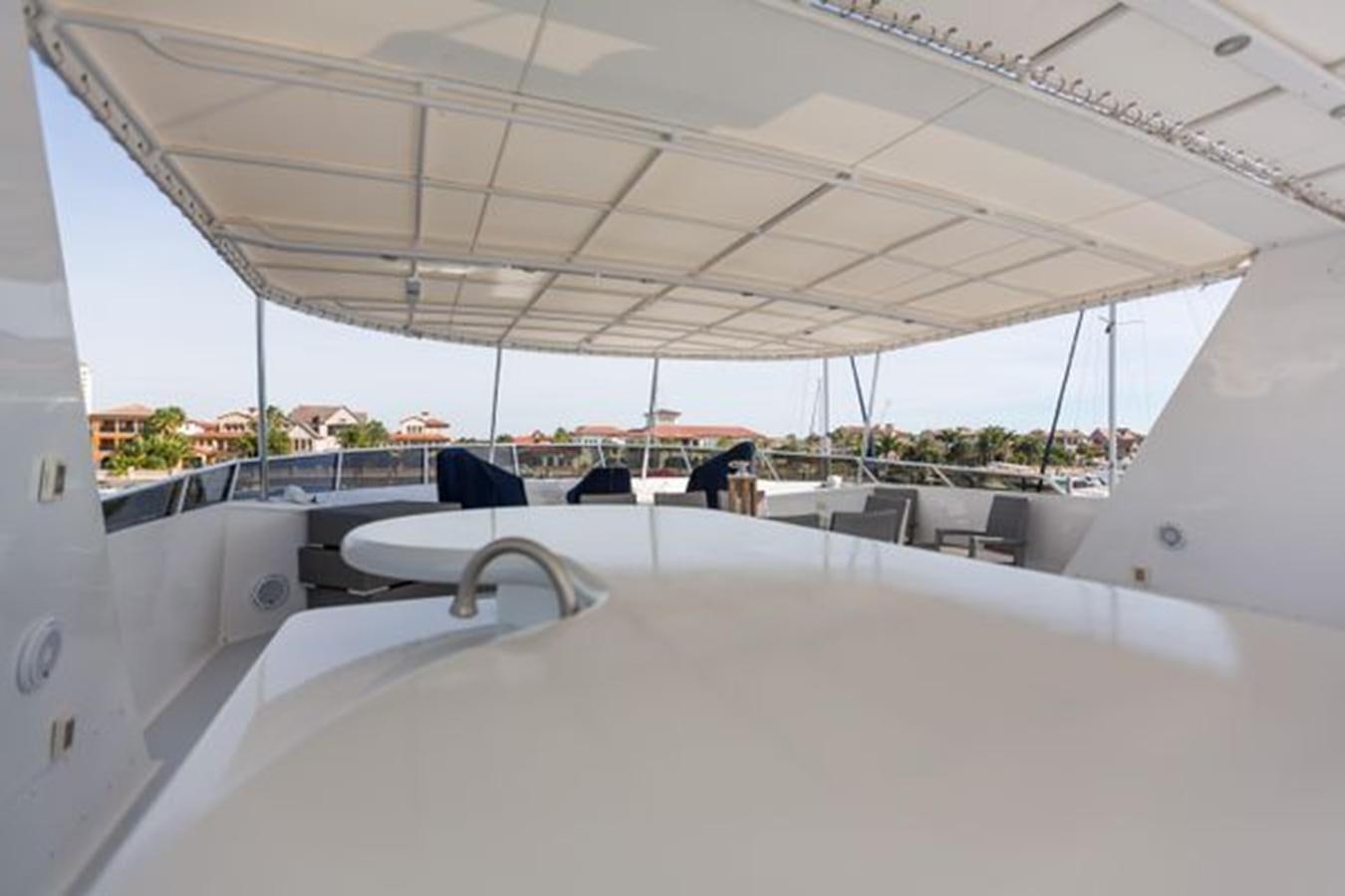 a white tent with a group of people in it aboard ISLAND SOUL Yacht for Sale