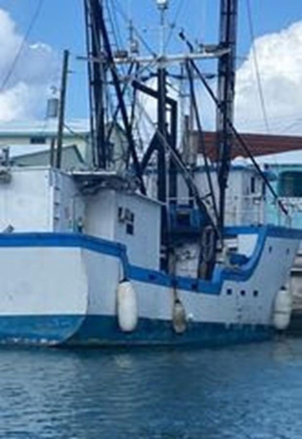 a large ship in the water aboard 1980 ST. AUGUSTINE 78 TRAWLER Yacht for Sale