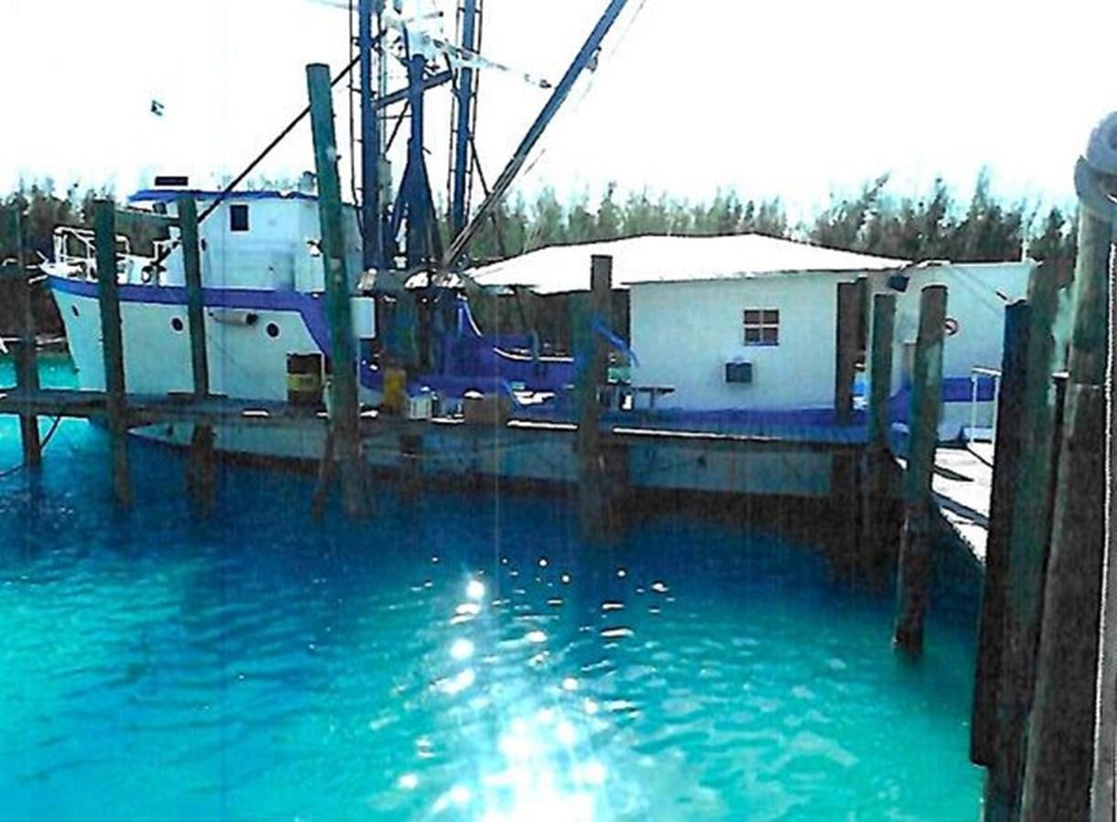 a group of boats docked aboard 1980 ST. AUGUSTINE 78 TRAWLER Yacht for Sale