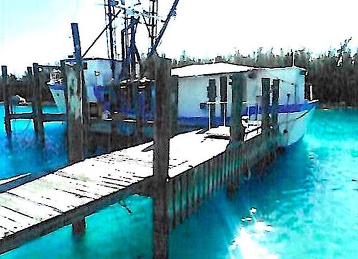 a long dock over a body of water aboard 1980 ST. AUGUSTINE 78 TRAWLER Yacht for Sale