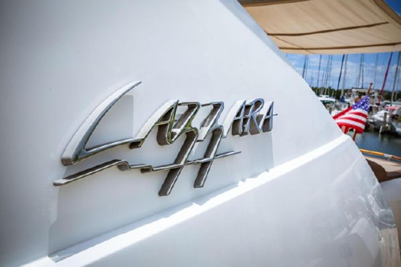 a white and black airplane aboard LOVIN LIFE Yacht for Sale
