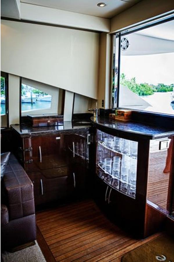 a kitchen with a large window aboard LOVIN LIFE Yacht for Sale