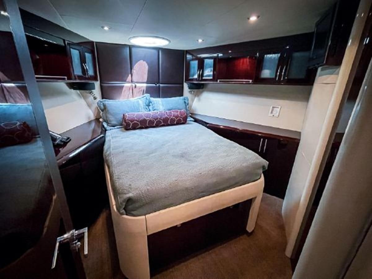 a bed in a room aboard LOVIN LIFE Yacht for Sale