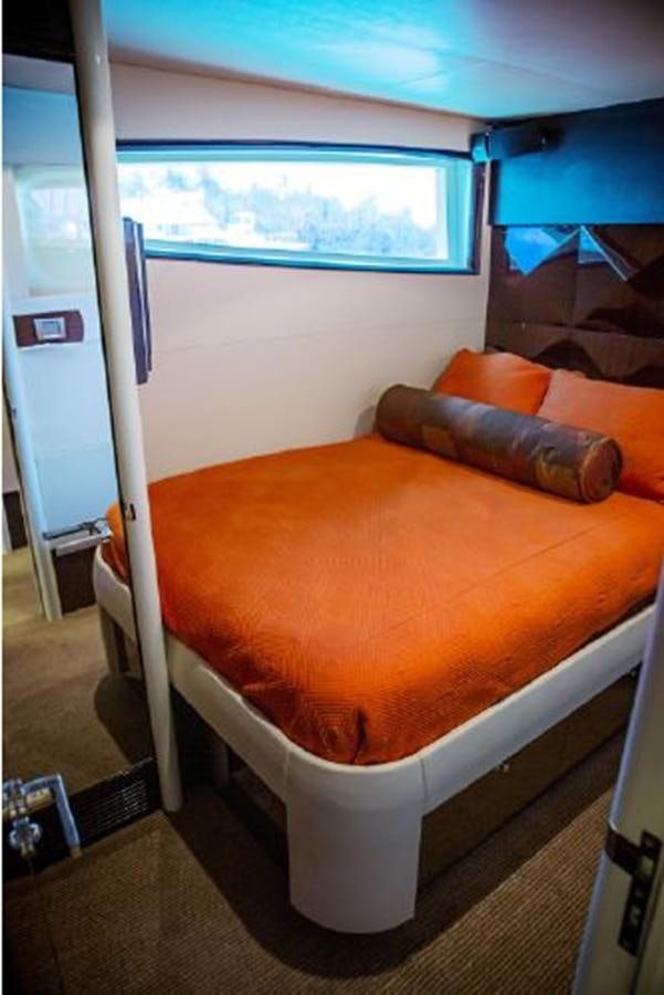 a bed in a room aboard LOVIN LIFE Yacht for Sale