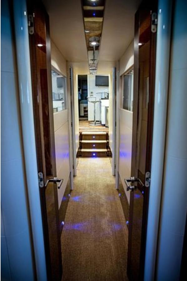 a hallway with doors aboard LOVIN LIFE Yacht for Sale