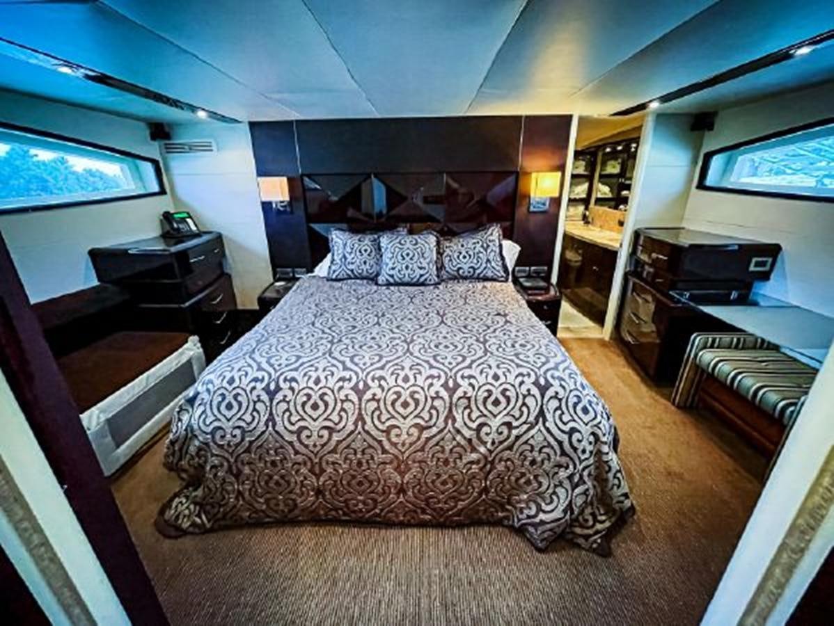 a large bed in a room aboard LOVIN LIFE Yacht for Sale