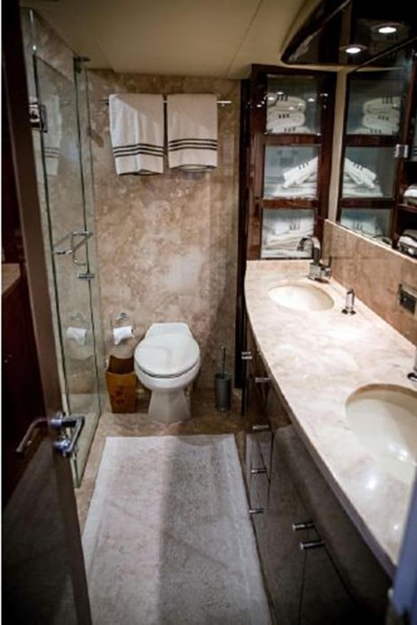 a bathroom with a sink and a toilet aboard LOVIN LIFE Yacht for Sale