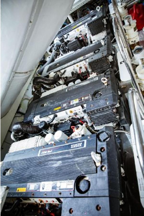 a car engine with a blue car hood aboard LOVIN LIFE Yacht for Sale
