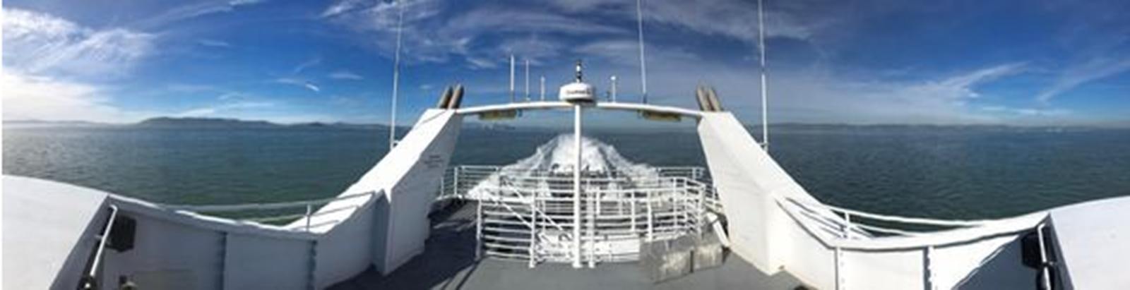 a large ship in the water aboard F350TXR Yacht for Sale