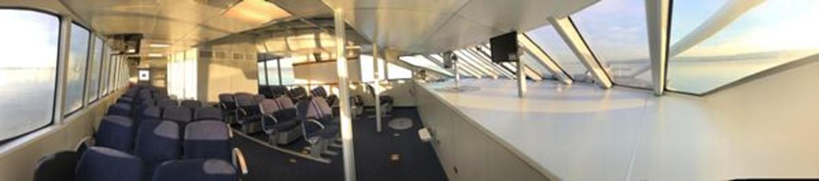 a group of people on a bus aboard F350TXR Yacht for Sale