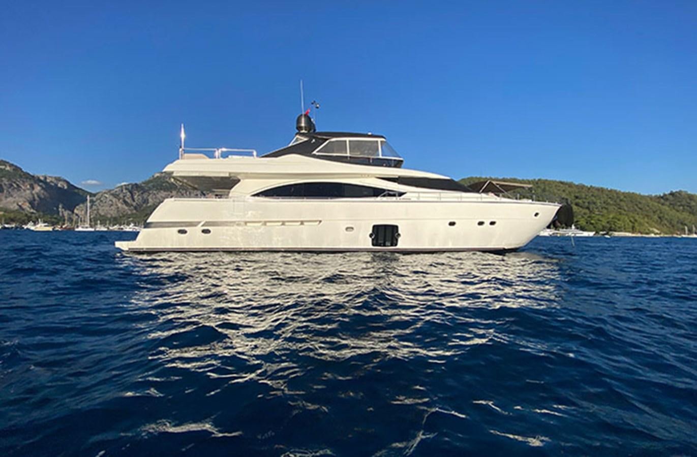 a white boat in the water aboard ADF Yacht for Sale