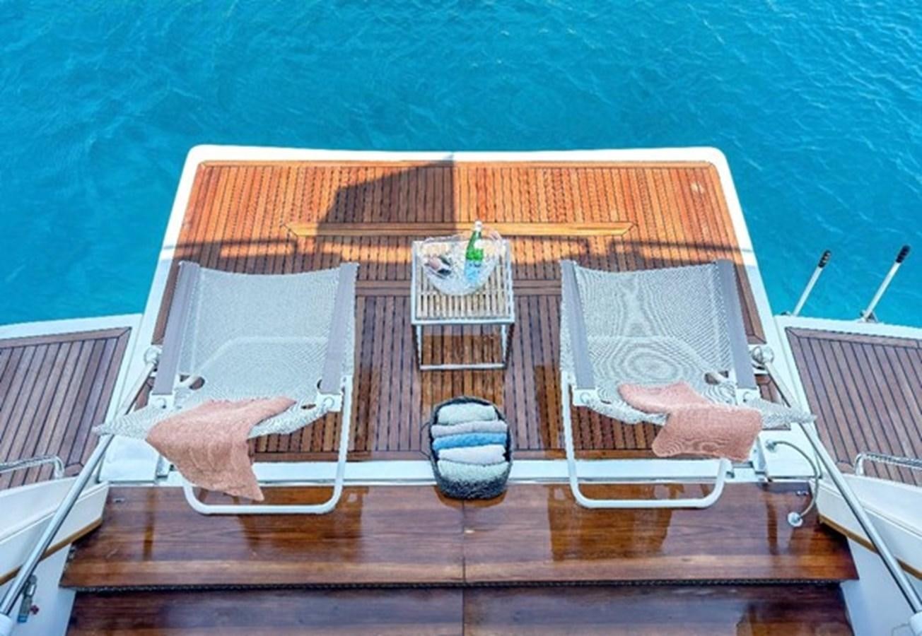 a house with a large window aboard ADF Yacht for Sale