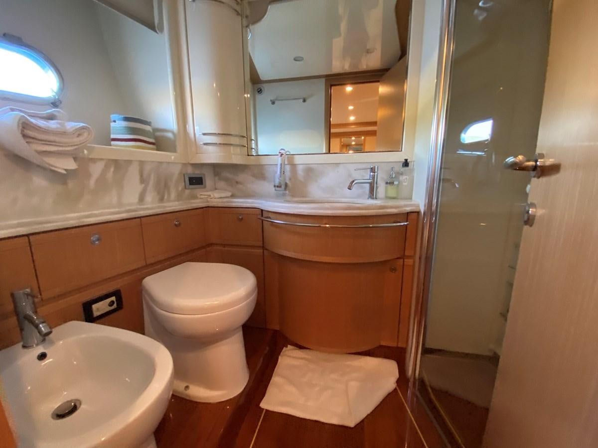 a bathroom with a toilet and sink aboard ADF Yacht for Sale