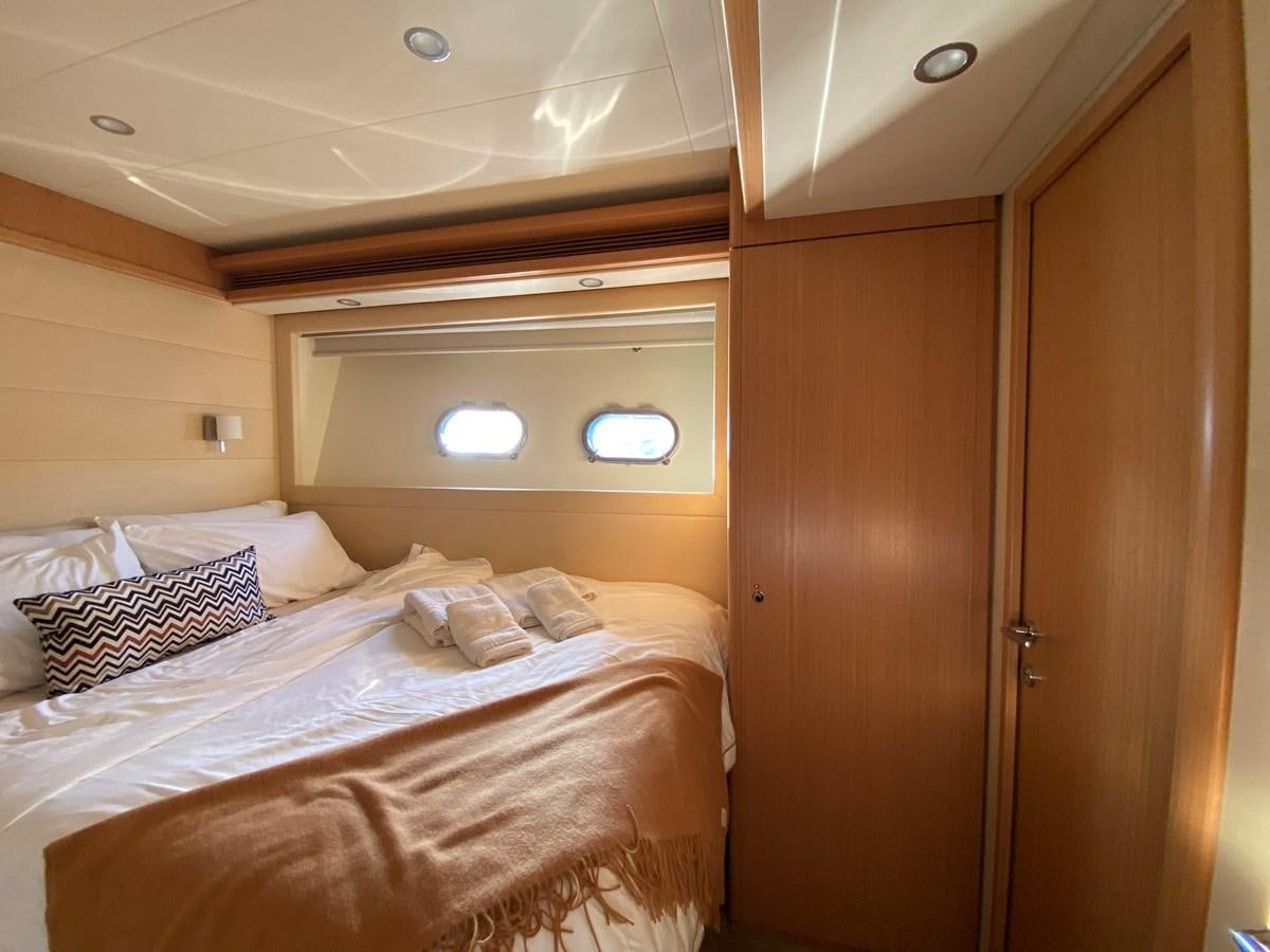 a room with two beds aboard ADF Yacht for Sale