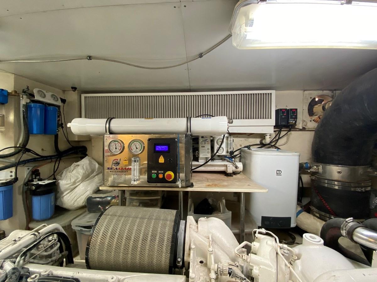 a room with a machine and equipment aboard ADF Yacht for Sale
