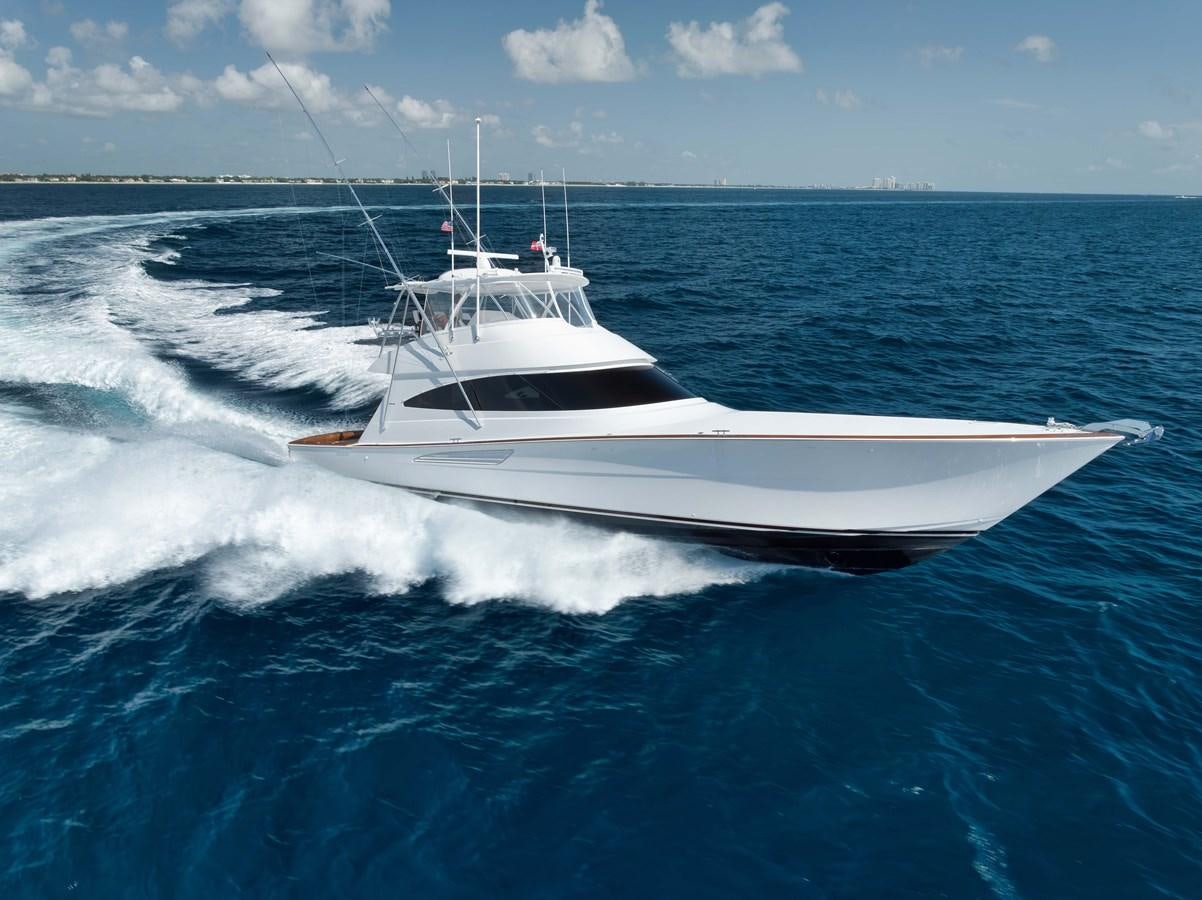 a white boat on the water aboard MISS CARRIE Yacht for Sale