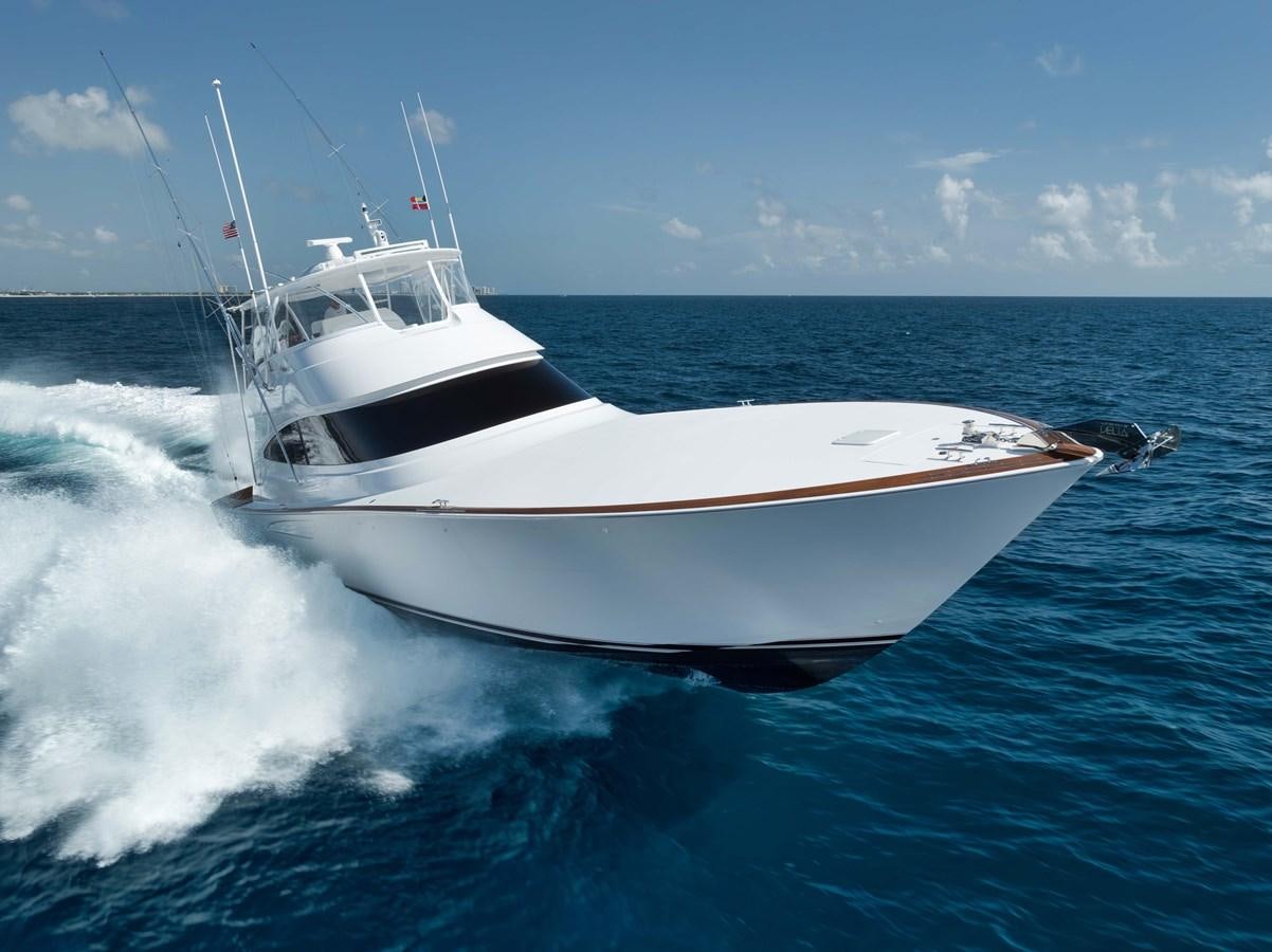 a white boat on water aboard MISS CARRIE Yacht for Sale